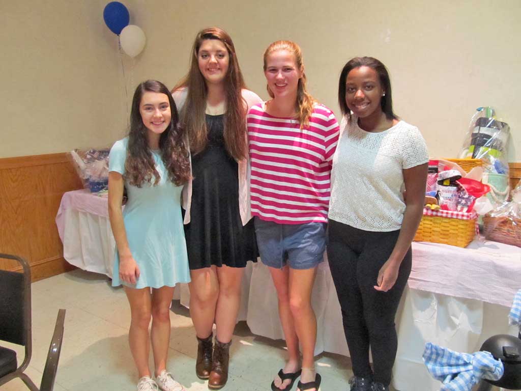 HARTSHORNE HOUSE YOUTH DIRECTORS served coffee at the annual Hartshorne House Breakfast on Tuesday at the West Side Social Club. From left: Helen Salvatore, Emma Hodzic, Gillian Russell and Leila Buonfiglio. (Gail Lowe Photo)