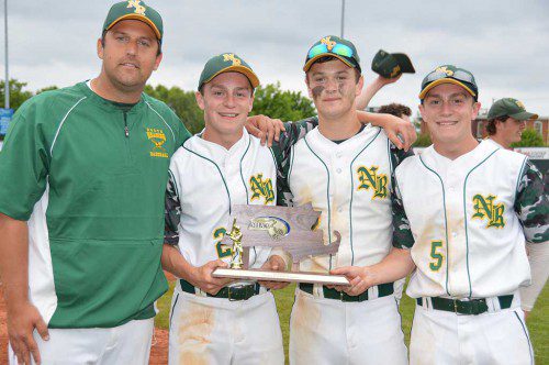 HORNET HARDBALL CAPTAINS (from left): Patrick Driscoll, Shawn DiVecchia and Michael Driscoll cradle the Division 3 North championship trophy with second year coach Eric Archambeault, named CAL Coach of the Year for the Kinney (Large School) Division. (Bob Turosz Photo)