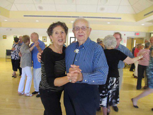PAULA HARRIMAN AND JOE MARKOWSKI took a spin around the dance floor during a recent Tuesday morning Big Band Dance held at the Senior Center while R&R 2000 performed music from the 1940s. (Gail Lowe Photo)