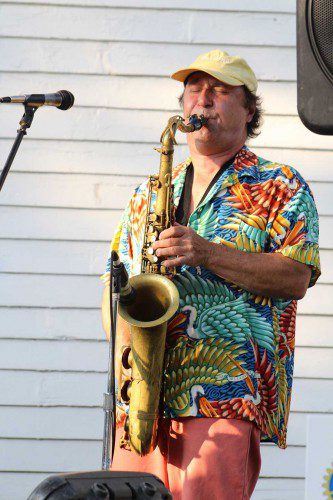 HITTING the right notes is guest saxophonist Klem Klimek, performing with the Brian Maes Band, in his solo during the band’s performance of “Tender Years” at the opening summer concert series on the common sponsored by Lynnfield Rotary. (Maureen Doherty Photo)