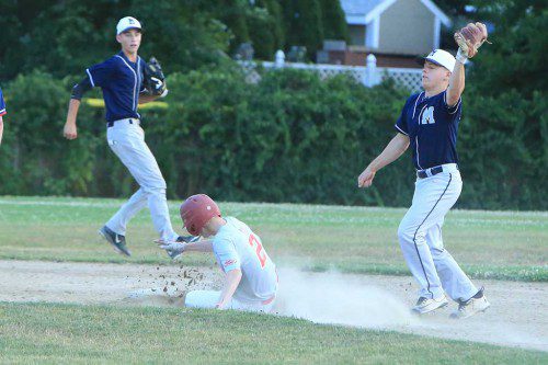 TYLER PUGSLEY steals second base after his second single of the game in the fifth inning. The Townies A team dropped a 7-1 decision to Medford last night at Walsh Field for only its second loss of the season. (Donna Larsson Photo)