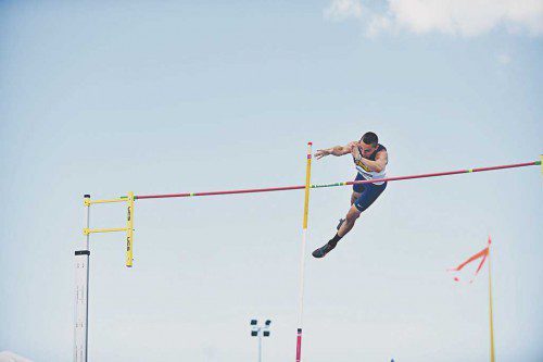 POLE VAULTING is a technique Johnny Braga has worked hard at improving the past two years. This year he reached 13 feet, 9 inches (4.20 meters) at both NCAA meets, the indoors at Pittsburg State in Kansas in March and outdoors at Bradenton in May. (Courtesy Photo)