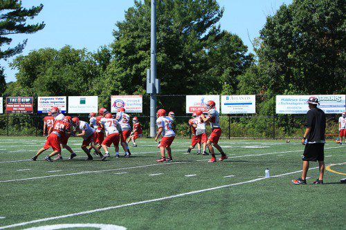 THE WARRIOR football team has been practicing since last Friday as it prepares for its season opener on Sept. 10 at Beverly. The Warriors have their first scrimmage on Saturday at Woburn. (Donna Larsson Photo)