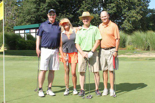 FOR THE SECOND consecutive year, the winning foursome was Bob Sardella, David Cullen and George Hurley, along with newcomer, Allison Petrosevich. (Sharon Nikosey Photo)