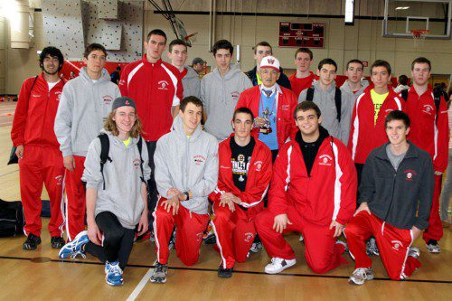 WMHS ATHLETIC Hall of Fame coach John DiComandrea, pictured with the boys’ indoor track team upon his retirement in 2012, will be honored in dedication ceremony at the Beasley Track and Field on Aug. 15.
