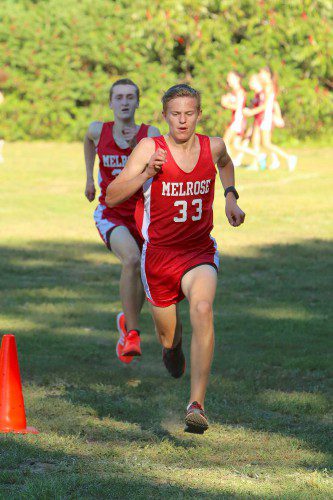 ADAM COOK topped the contingent at the 2016 Bob MacDougall Invitational in Tewksbury. Cook placed first among all runners and helped the Melrose boys team (2-0) sweep the field. (Donna Larsson photo)