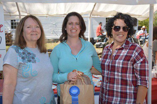 TOP CHEFS. The winners of the apple pie baking contest at this year’s Apple Festival display their ribbons after the big announcement was made. From left: Evelyn Connolly, third place; Rebecca Lowe, first place and Carolyn Costantino, second place. (Bob Turosz Photo)