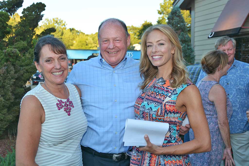 JENNY JOHNSON, co–host of NESN’s TV show “Dining Playbook” joins Horseshoe Grille owners Kathi and Pat Lee on the restaurant’s patio for their celebration of the Horseshoe’s 90th anniversary Monday. A full house of guests attended the affair. (Bob Turosz Photo)