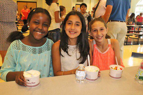 INCOMING fifth-graders (from left): Sachelle Sterlin, Bianca Marano and Laci Robbins enjoyed each other’s company along with their ice cream sundaes during the traditional first day of school party held to welcome the newest students to the middle school. LMS currently has the highest enrollment among the four schools with 702 students. (Maureen Doherty Photo)