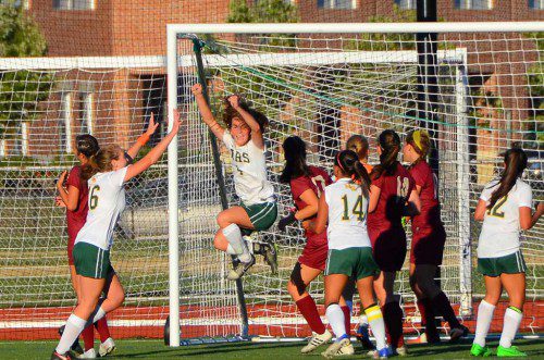 HAPPINESS IS...Junior Meredith Griffin jumps for joy over her goal, scored on a great header on a corner kick from Jess Muise to put the Hornets ahead of Newburyport, 3–0. (John Friberg Photo)