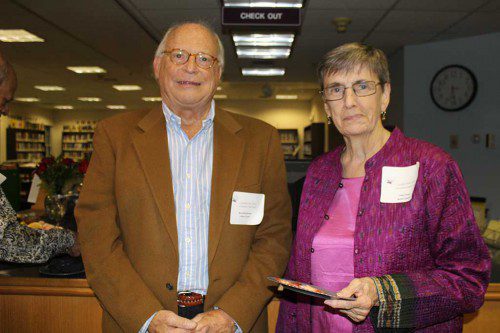 LIBRARY trustee Russ Boekenkroeger, who serves as chairman of the Library Building Committee, chats with retired Library Director Nancy Ryan during the launch of the Lynnfield Public Library Foundation Friday night. A pledge of $1,000 to the foundation was made in Ryan’s honor by former trustee Stanley Schantz. (Maureen Doherty Photo)
