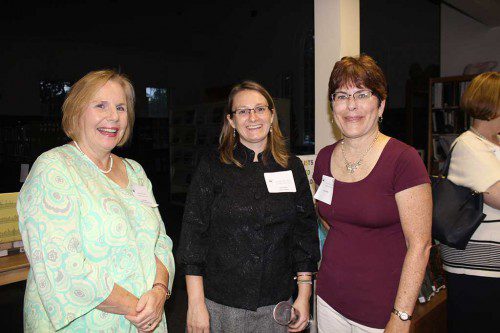 MINGLING during the after-hours kick off event for the newly formed Lynnfield Public Library Foundation Friday night are (from left): Ann Decker, president of the Friends of the Lynnfield Library (FOLL), Library Director Holly Mercer and FOLL publicity coordinator Cindy Ouellette. (Maureen Doherty Photo)