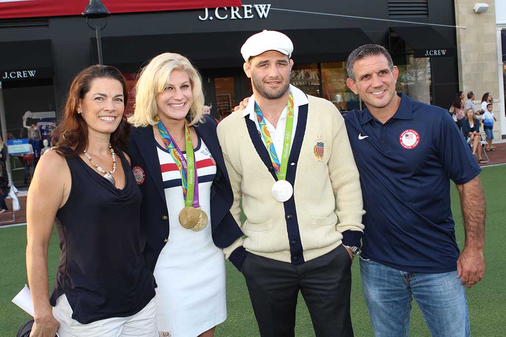 OVER 200 people attended Meet the Medalists at MarketStreet Sept. 21. From left, retired Olympian and Lynnfield resident Nancy Kerrigan, judo gold medalist Kayla Harrison, judo silver medalist Travis Stevens, and 2016 U.S. Olympic team coach and two-time judo Olympic bronze medalist Jimmy Pedro. (Photo by Priestley’s Fine Art Photography)