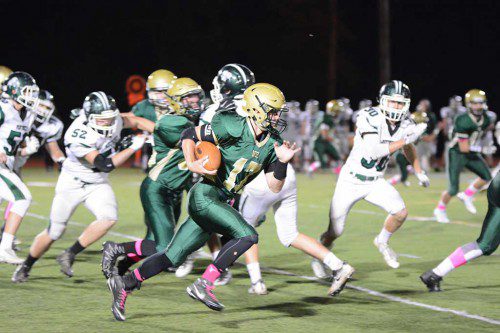 HORNET QUARTERBACK Kyle Bythrow is off to the races on this 39 yard jaunt that brought the ball to Pentucket's 14 yard line. (Bob Turosz Photo)