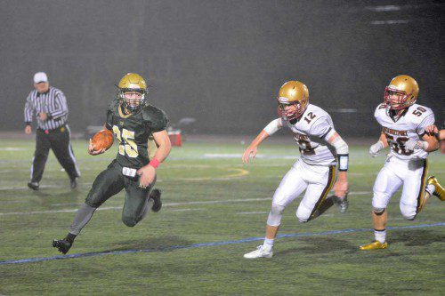SENIOR RUNNING BACK Matt McCarthy had another special night for the Hornets with nearly 200 yards rushing as the Hornets beat Newburyport to become champions of the CAL Kinney Division. (Bob Turosz Photo)