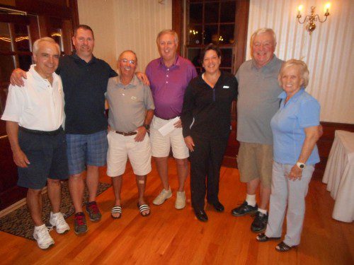 THE WINNERS of the low gross and low net awards at the TSF Golf Tournament were (L to R): Charlie Hartshorne, Rob Curley, Pat O’Keefe, Jim Curley, Anita Loughlin, Marty Ammer and Eleanor DePasquale. (Bob Curran Photo)