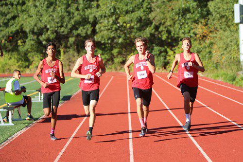WARRIOR RUNNERS (from left to right) Rohan Singhvi, Nick McGee, Ryan Sullivan, and Riley Brackett secured the top four places with times of 17:05 and 17:06 in Wakefield's 15-50 win over Wilmington. (Donna Larsson Photo)