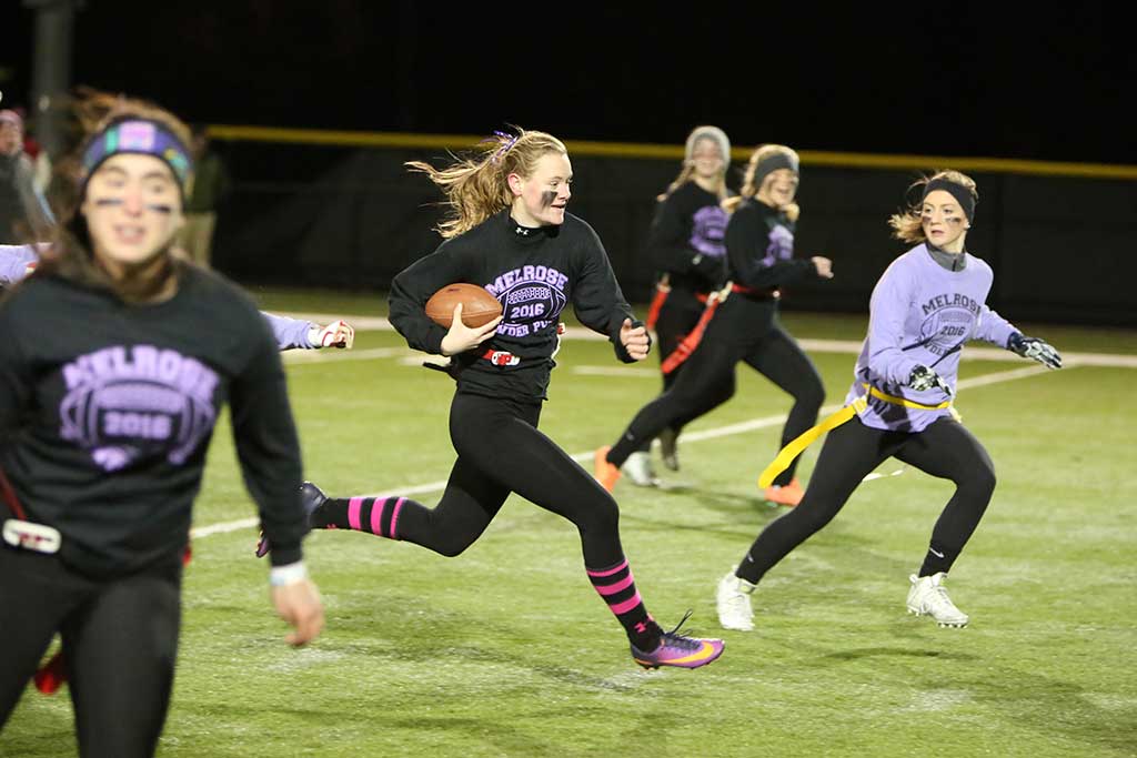 SENIOR ANNE MORRISON was named most valuable player in this year’s Powder Puff football game with Melrose High juniors. The Class of 2017 hung on to win Monday’s battle, 18-12. (Donna Larsson Photo)