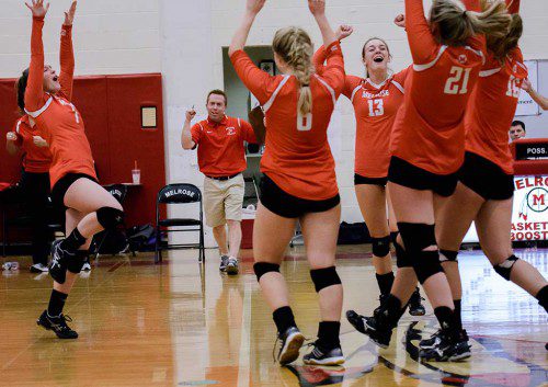 MELROSE VOLLEYBALL had plenty to reason to celebrate on Nov. 4 when they took out a tough Weston opponent, 3-0, in the opening round of the Div. 2 North playoffs. (Steve Karamapalas photo) 