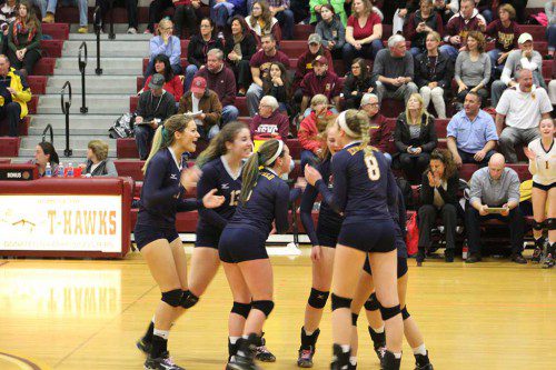 THE VOLLEYBALL team celebrates making a key point in game two against the Case Cardinals at the Div. 3 state semifinals Nov. 15. (Maureen Doherty Photo)