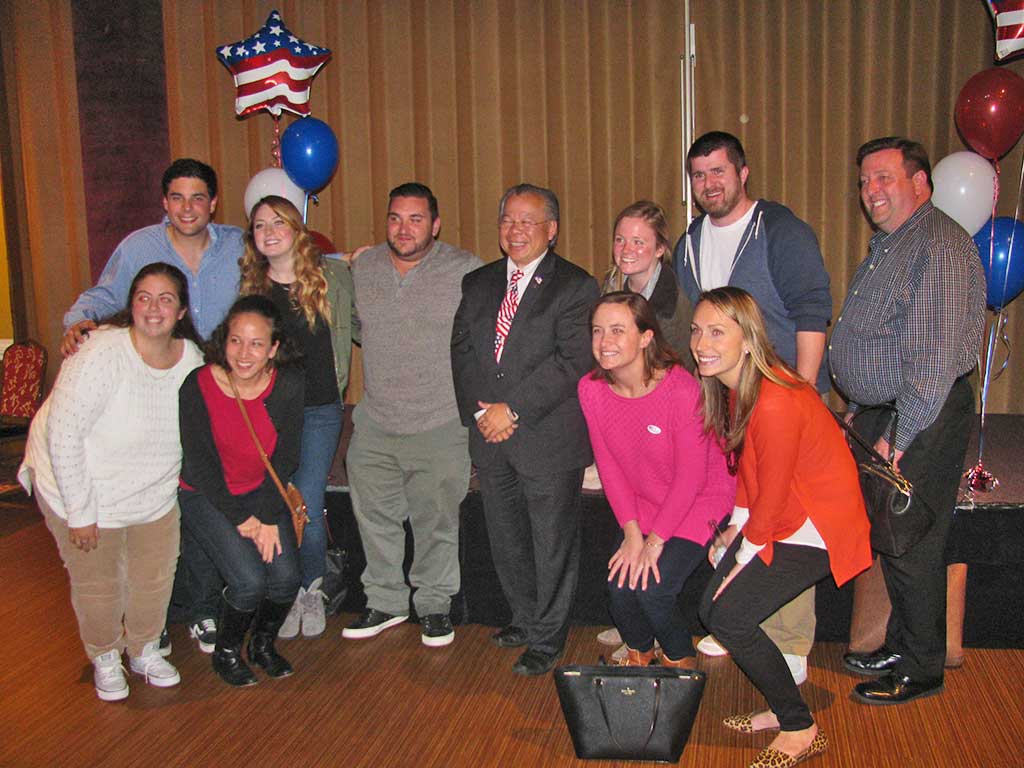 REP. DONALD WONG savors victory with a group of campaign workers and supporters at his celebration last night at the Kowloon in Saugus. (Mark Sardella Photo)