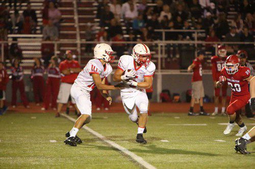 MIKE PEDRINI and QB Jack Mays did all they could on offense for the Melrose Red Raider football team, but the team fell in the opening round of the Div. 2A playoffs last Friday against Gloucester, 18-6. Melrose hosts Wayland tonight at 7:00 p.m. in consolation play. (Donna Larrson photo)