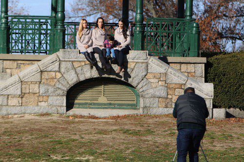 IT'S NOT ALWAYS easy to get everyone to sit still for a holiday picture, as this shot at the Bandstand shows. (Donna Larsson Photo)