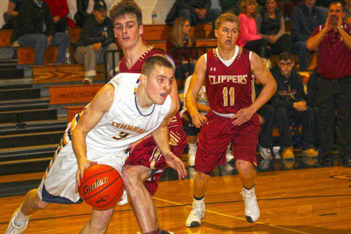 JUNIOR Zach Shone (3) finished with 17 points during the Pioneers’ 67-48 victory over Newburyport Dec. 23.  (Dan Tomasello Photo)