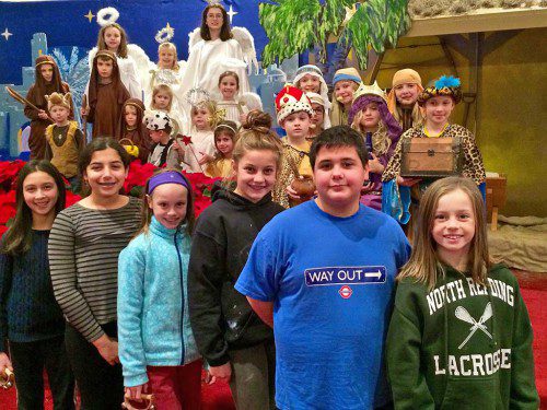 CHILDREN AT the Union Congregational Church pose for a picture following the dress rehearsal for their Christmas pageant “The Coming Of The Christ Child (Courtesy Photo). 