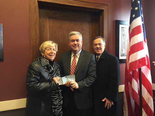 MARY SEXTON AND BILL DONOHUE of Sexton & Donohue present Mayor Rob Dolan with a donation to the Emergency Fund.