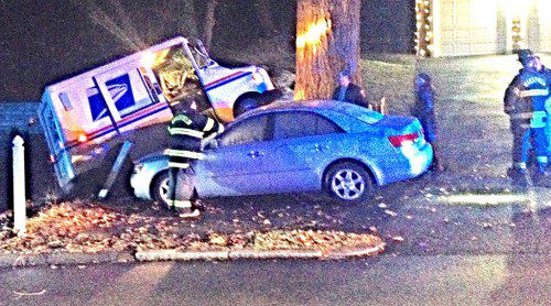 ICY ROADS may have contributed to an accident on Green Street at about 7:30 last night in which a US Postal Service truck hit a fence and a tree before coming to rest on the hood of a parked car.