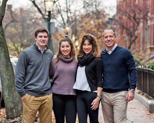 MARK ELDRIDGE, a Wakefield native, is chief executive officer of ALKU, a company The Boston Globe lists as one of the best places to work. Eldridge is shown with his family, from left: Son Johnnie, daughter Maddie and wife Kathie. (Courtesy Photo)