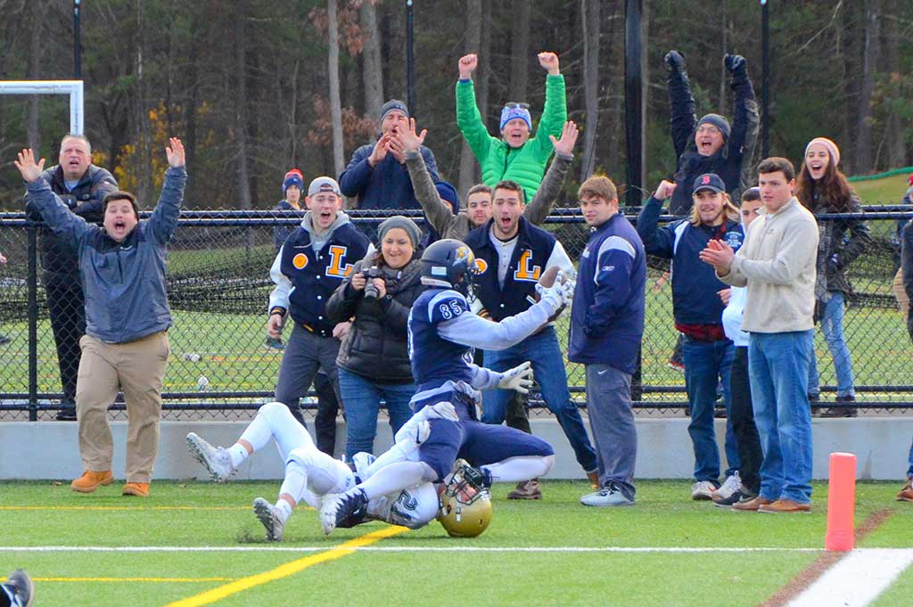 PIONEER fans went wild as Louis Ellis pulled down a 30-yard touchdown pass from QB Matt Mortellite with time running out in the 58th annual Thanksgiving game against North Reading. The catch brought the Pioneers to within one point, 21-20, ending the day’s scoring, and gave the senior his 14th career TD reception, tying the school record. (John Friberg Photo)