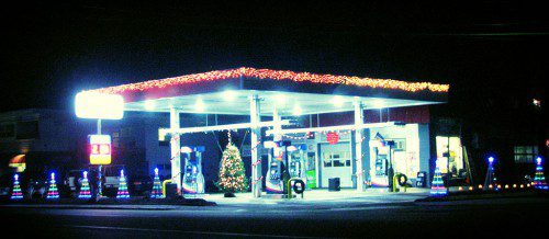 WAKEFIELD GAS & SERVICE on Water Street is all decked out for the season. (Mark Sardella Photo)