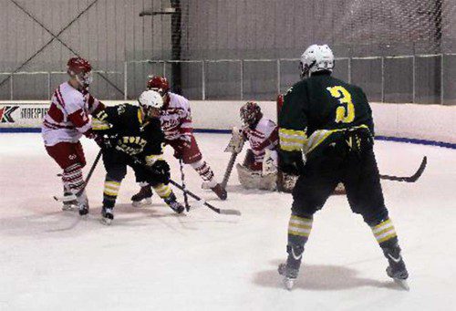 NORTH READING had their first tie 1-1 vs Newburyport Friday night. First line mates score the only point of the game. Josh Zelikman assisted Matt Corrieri for the tying goal. (Courtesy Photo/Frank Brachanow)