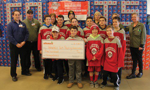 SHAW'S recently donated $500 to the Wakefield Youth Skating Association (WYSA). Pictured receiving the donation from Shaws are members of the WYSA Peewee AA team. WYSA will be holding its annual fundraiser, featuring the Buckley Brothers Band, at the Crystal Community Club from 7:30 p.m.-11:30 p.m. on Saturday, Feb.11. For more information on WYSA please visit its website at www.wysa.net.