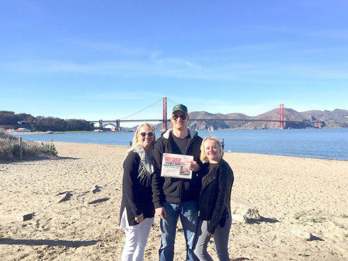 THE UPTONS OF MELROSE — Kim, Jon and Rachel — join together in San Francisco and read the Weekly News near the Golden Gate Bridge.