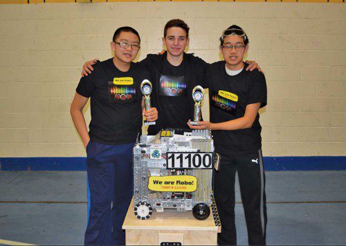 FROM THE LEFT are Calvin Yee, Cole Kraus and Preston Yee with their award-winning robot.