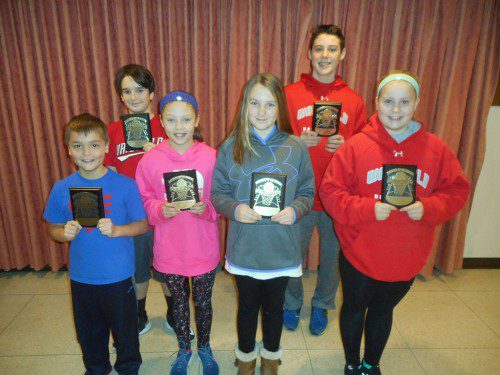 WINNERS OF the Wakefield Knights of Columbus “Free Throw Championship” with their Championship plaques are (front, L to R): John Fitzgerald, Shea Suntken, Katherine McPhail and Megan Cataldo. In the back (L to R) are Owen Riddell and Logan Cosgrove.