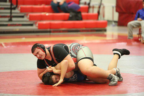 DAN DIMEGLIO, a senior, won by pin at the 285 weight class by beating Malden’s Deandre Fabrizio. The Warriors easily won the meet by a 41-6 score to go to 9-2 on the season. (Donna Larsson File Photo)