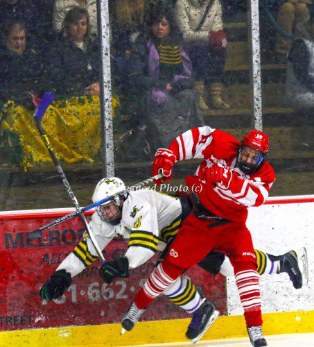 A North Reading and Masco player collide during last weekend’s game. (Al Pereira/Advanced Photo)