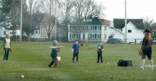 WITH MOTHER NATURE serving up an early sample of spring weather, some took advantage of the opportunity to get in a little batting practice on Veterans Field. (Mark Sardella Photo)