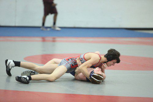 AIDAN ARMSTRONG, a sophomore (top), posted a pair of victories at the 120 lb. weight class in Wakefield’s quad meet on Friday night. One win was pin and the other by major decision. (Donna Larsson File Photo)