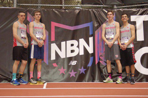 THE 4X800 relay team set a new school record with a time of 7:59.61 and placed 21st in the championship division at the New Balance Indoor Nationals Meet. From left to right are Adam Roberto, Ryan Sullivan, Nick McGee, and Matt Greatorex.
