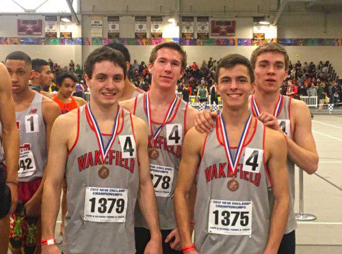 THE WMHS 4x800 relay team set a new school record time of 8:00.31 and placed fourth at the New England Championship meet. The four runners (from left to right) are Adam Roberto, Nick McGee, Matt Greatorex, and Ryan Sullivan.
