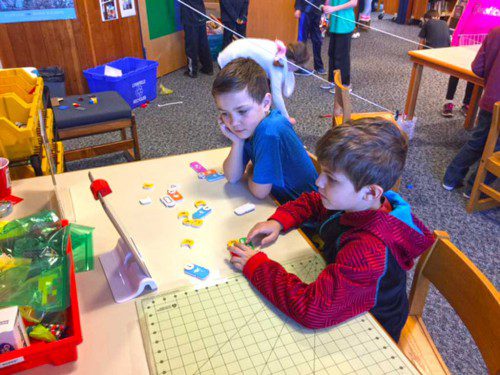 SECOND GRADERS Cole Mackinnon (left) and Ephram Donahue undertake a coding assignment on iPads at Huckleberry Hill School’s new maker space recently. (Courtesy Photo) 