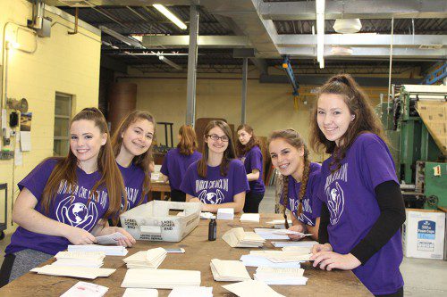 DURING THE 2017 Warrior Give Back Day March 8, the Wakefield Item Company was grateful to be joined by 10 young women from the high school who assisted in a mailing and organizing our library of clippings. At the front table from the left are Vanessa Gebhard, Ariana Buccelli, Sarah Margerison, Melanie Benedetto and Hana Dixon. At the back table are Jordyn Pugsley, Marika Shively, Emily Pudvah, Sophia Gosselin-Smoske and Kira Strauss. (Keith M. Curtis Photo)