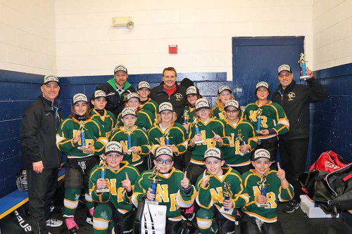 The North Reading Squirt Gold hockey team captured their division championship in the Valley Hockey League on April 8th. The Hornets entered the playoffs as the top seed thanks to an impressive eight game winning streak to end the season allowing them to capture first place with an 18-6-3 record.