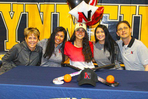 FIELD HOCKEY athlete Lilli Patterson (center) was joined by her coach and family members at her signing ceremony committing to play field hockey for Northeastern. From left: Pioneer field hockey coach Mamie Reardon, her mother, Mei Patterson, her sister, Tia Patterson, and her father, Dave Patterson. (Maureen Doherty Photo)