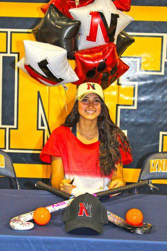 LYNNFIELD Pioneer Lilli Patterson officially became a Husky last Thursday when she signed her letter of intent to play field hockey for Div. 1 Northeastern University.  (Maureen Doherty Photo)